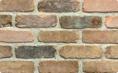 white tumbled clay brick